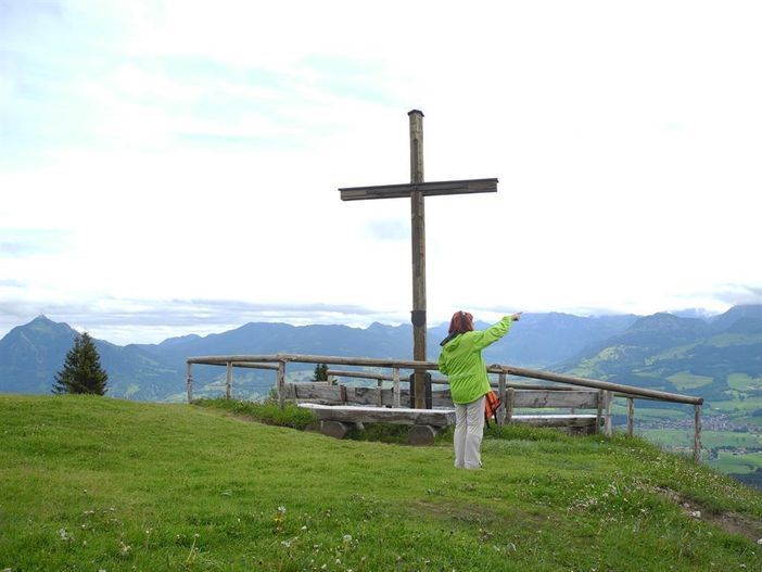 Auf dem Gipfel und die Seele baumeln